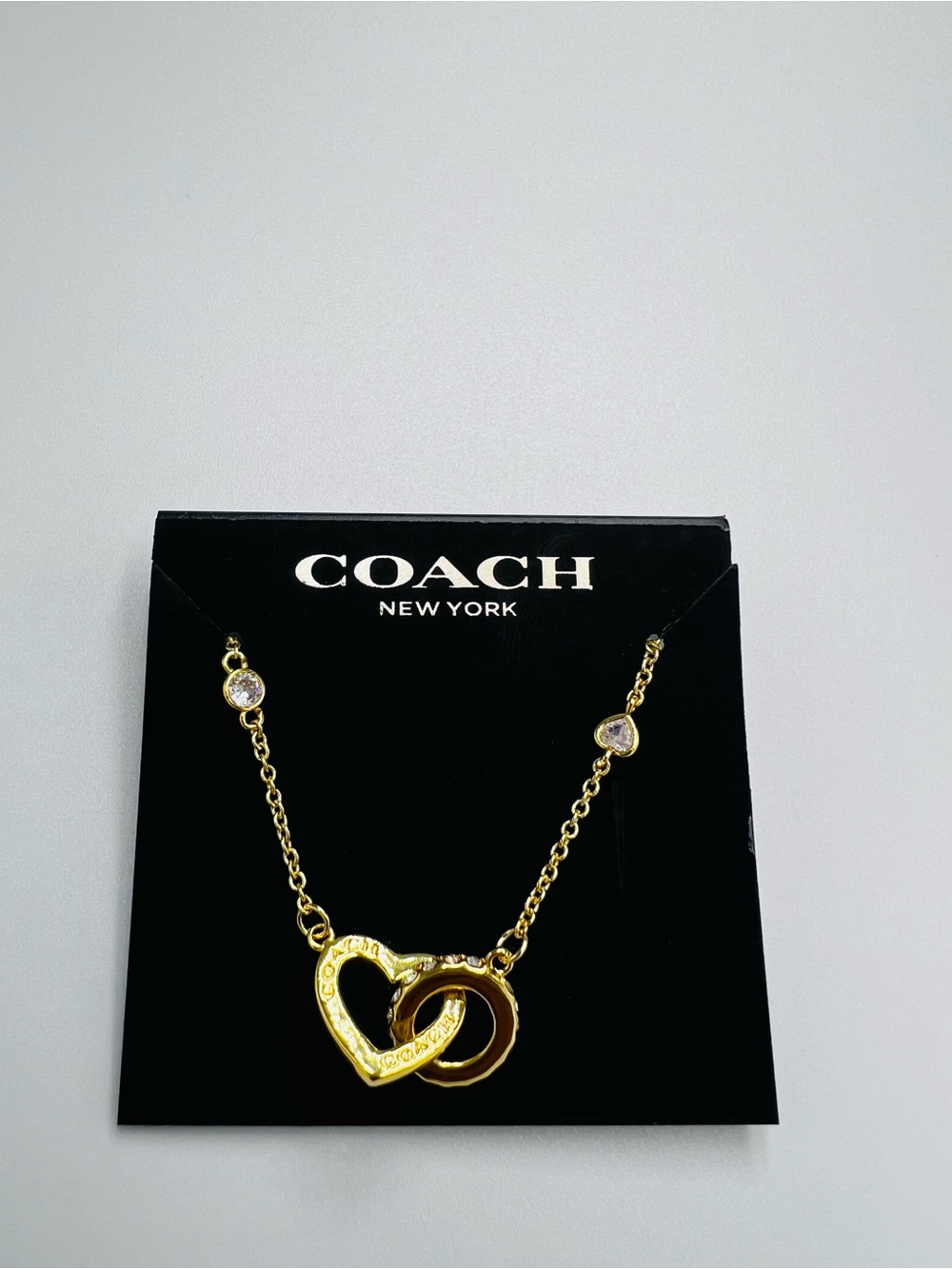 Coach Interlocking Heart and Ring Necklace. NWOT